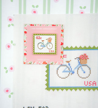 Lake Shore Needlepoint Petals and Pedals Postage Stamp needle minder with a bicycle and flower basket