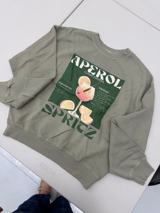 Tres Bien Aperol Spritz graphic sweatshirt in sage with premium wash and green cocktail recipe graphic