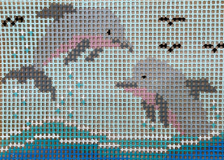 Purple Palm Designs Dolphin Duo kids needlepoint kit canvas: two gray dolphins leaping over teal ocean waves with birds in the sky